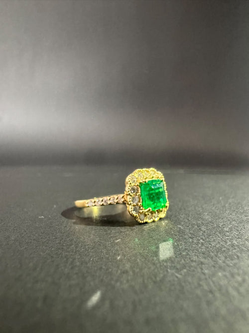 Square emerald ring in a diamond halo (Ref. 291)