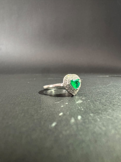 Heart-shaped emerald ring with a diamond halo (Ref. 193)