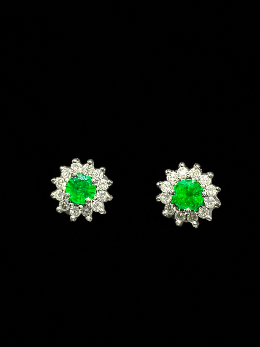 Round emerald stud earrings in a diamond flower setting (Ref. 82)