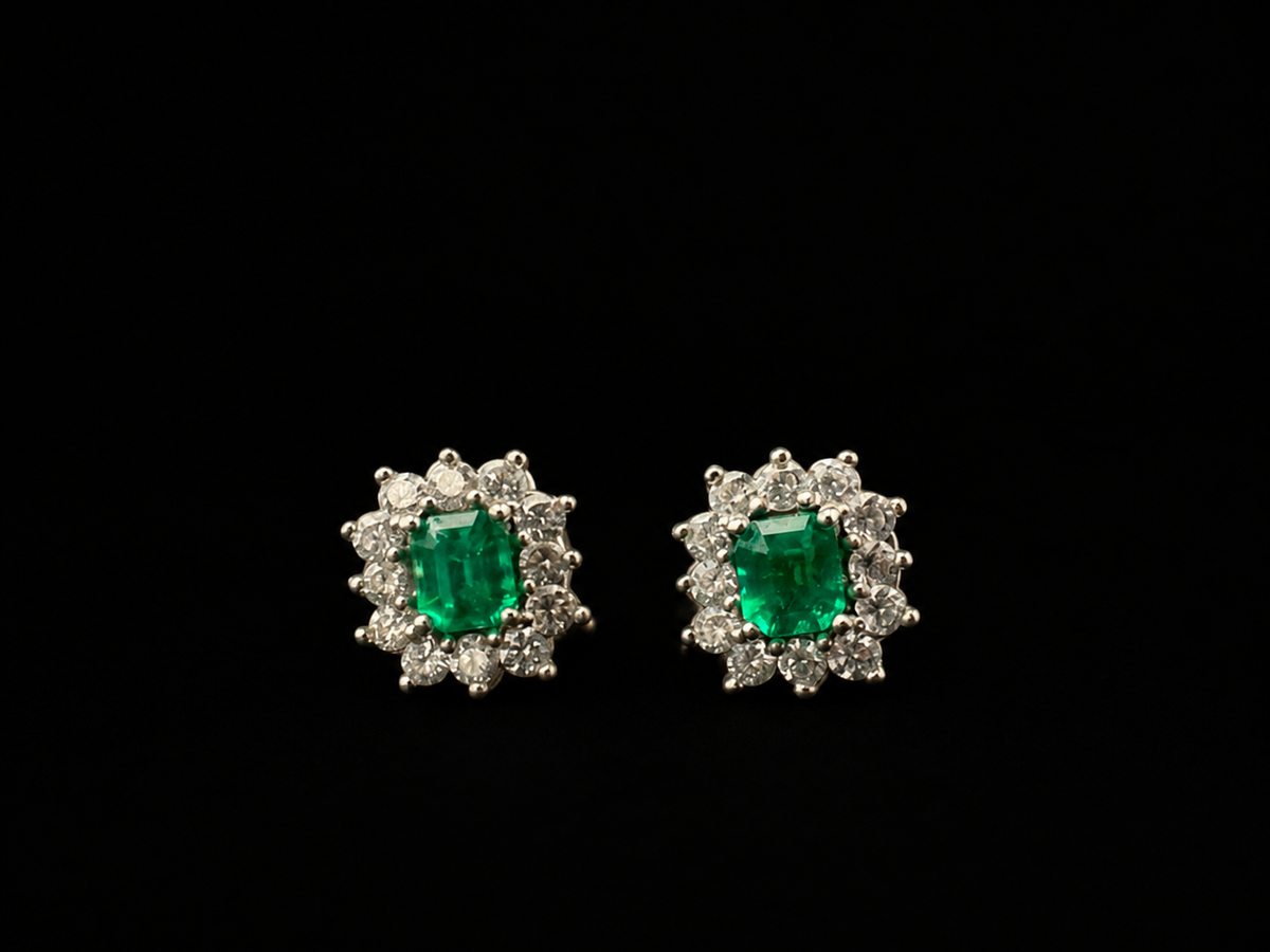 Rectangular emerald stud earrings in a diamond halo (Ref. 221)