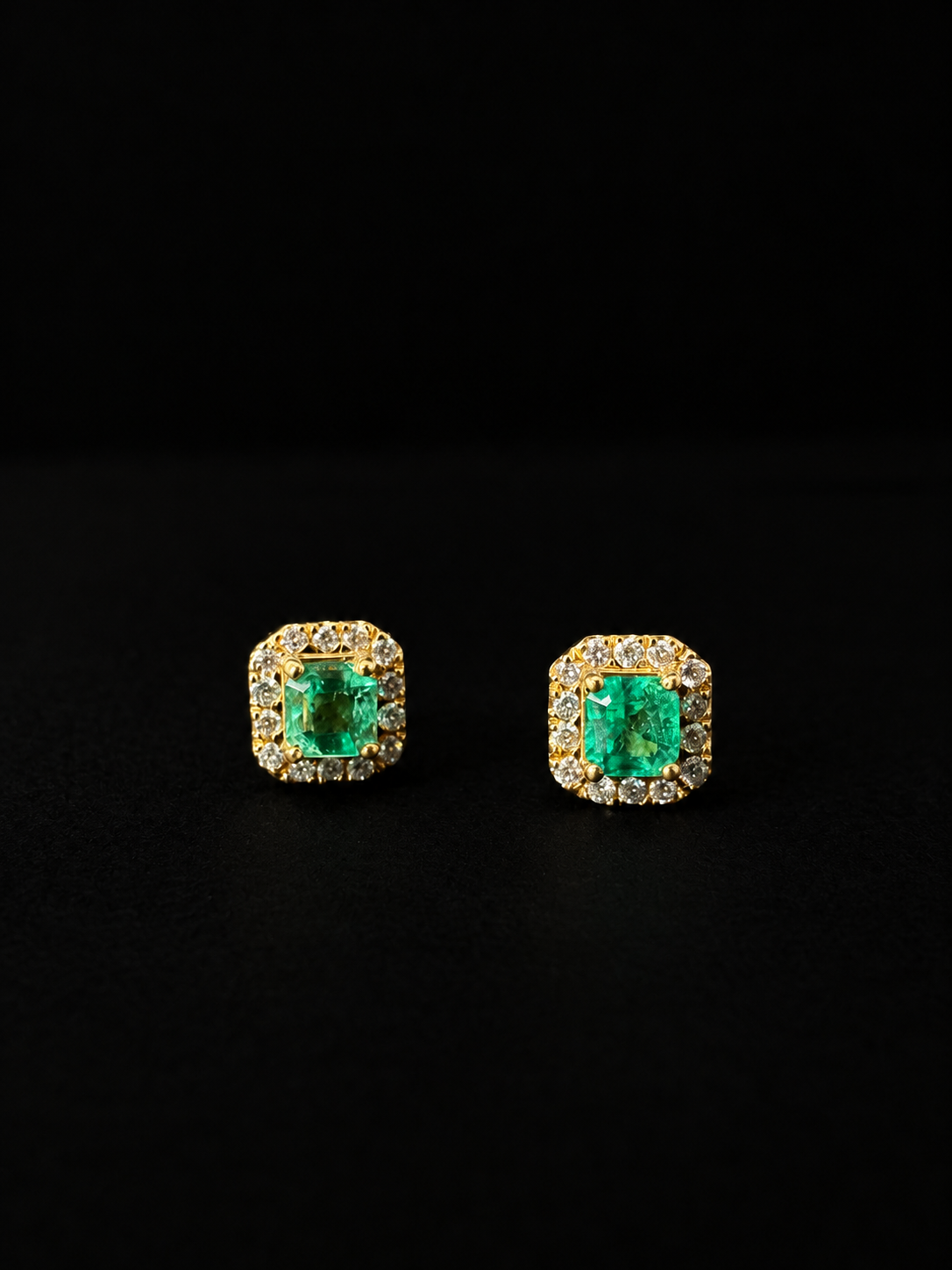 Square emerald stud earrings in a diamond halo (Ref. 231)