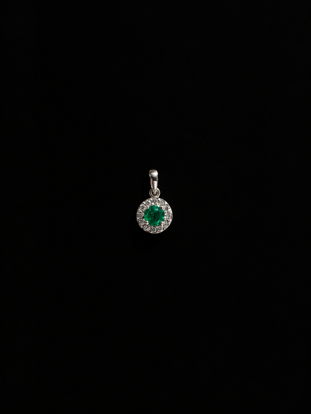 Dije con esmeralda redonda en halo (Ref. 310)