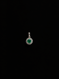 Dije con esmeralda redonda en halo (Ref. 310)